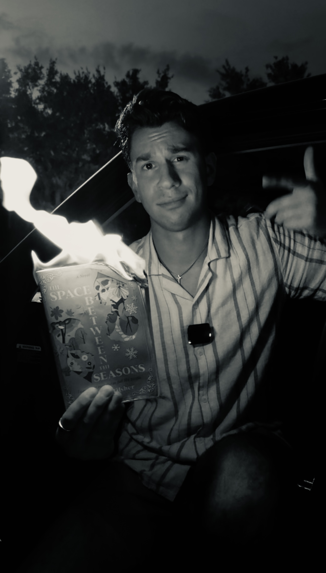 Justice Tilsher with his book